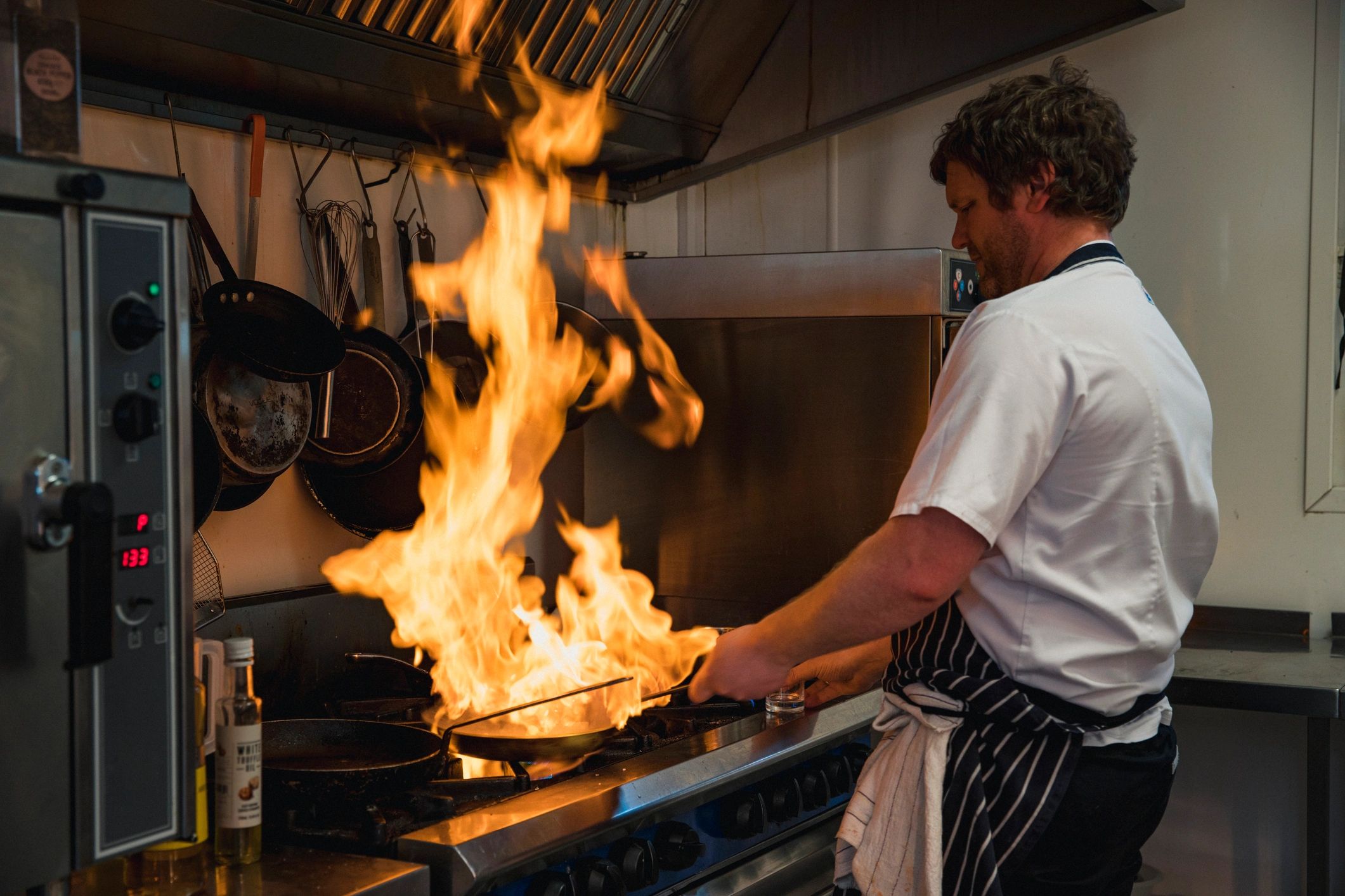 Chef cooking in a professional kitchen