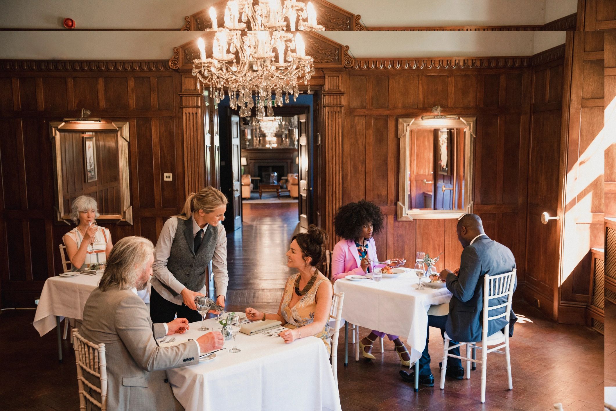 Elegant catered dining experience with guests at the table